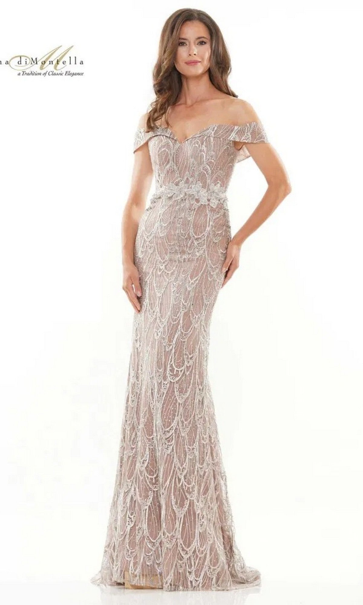 A woman stands on a light background wearing the Rina Di Montella RD2739, a floor-length coffee formal dress with off-the-shoulder design and intricate beaded detailing.